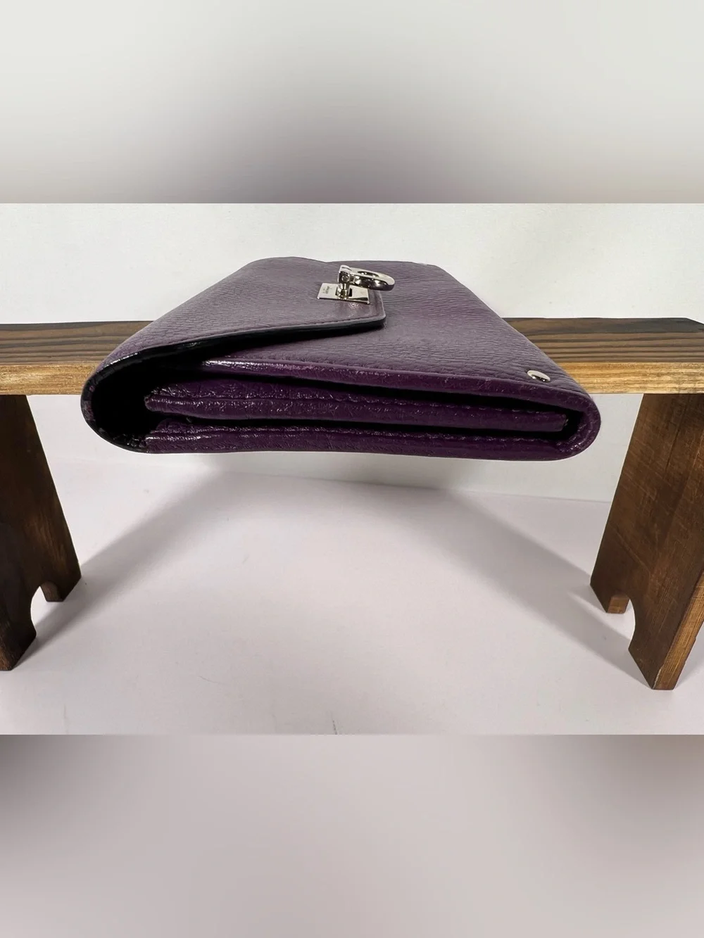 1039: Salvatore Ferragamo Gancini Continental Wallet Purple Leather